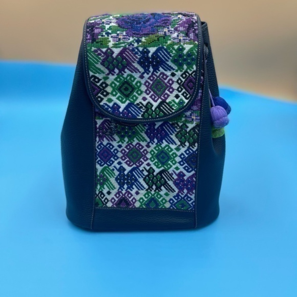 Like new! Vegan Leather Partial Embroidered Pattern Backpack
